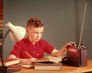 1960s BOY LISTENING RADIO...